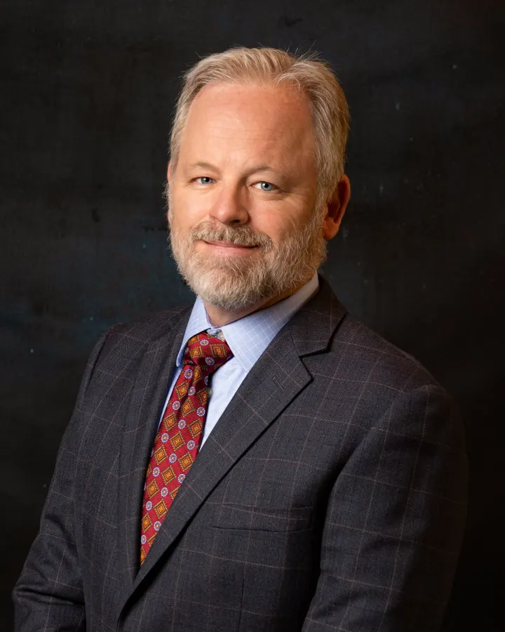 Man in suit and tie with beard