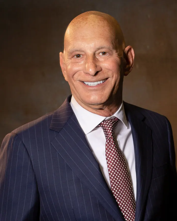 Man in dark pinstripe suit