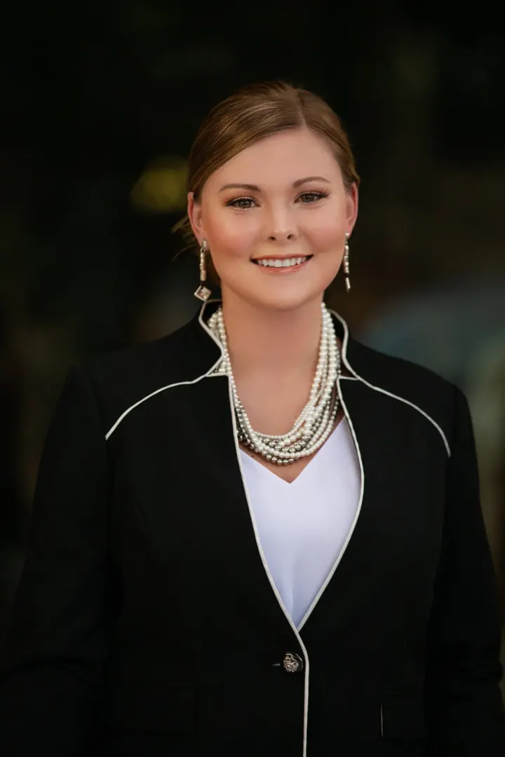 Professional woman with pearl necklaces