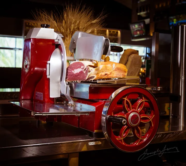 Vintage red meat slicer with prosciutto