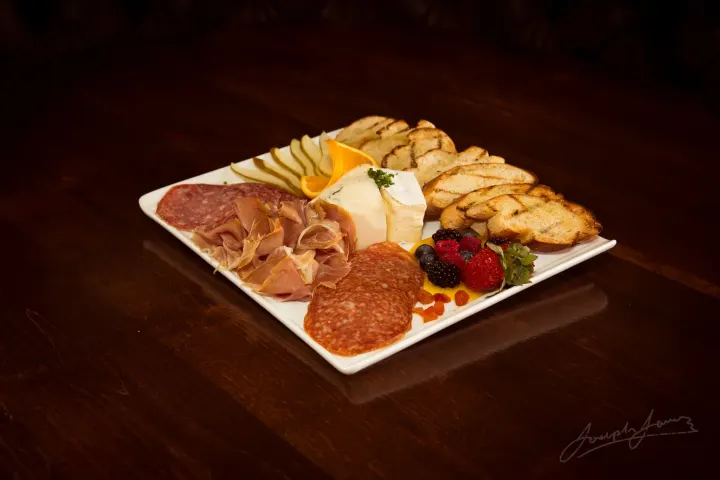 Charcuterie board with meats and cheese